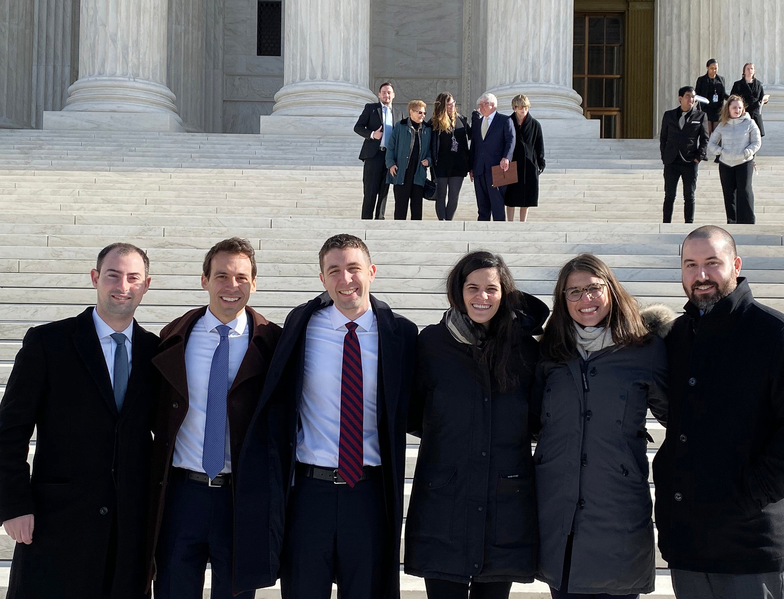Group shot in front of the U.S. Supreme Court